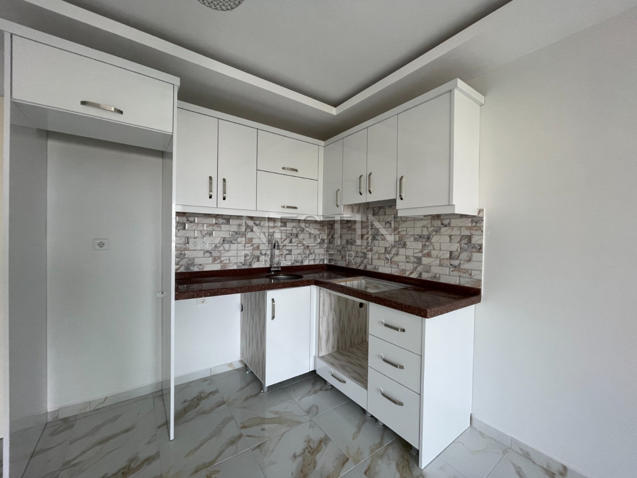 Апартаменты 1+1 по очень выгодной цене в районе Махмулар фото 9