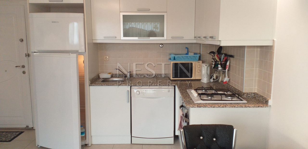 Просторная квартира 1+1 с видом на море в районе Джикджилли фото 11