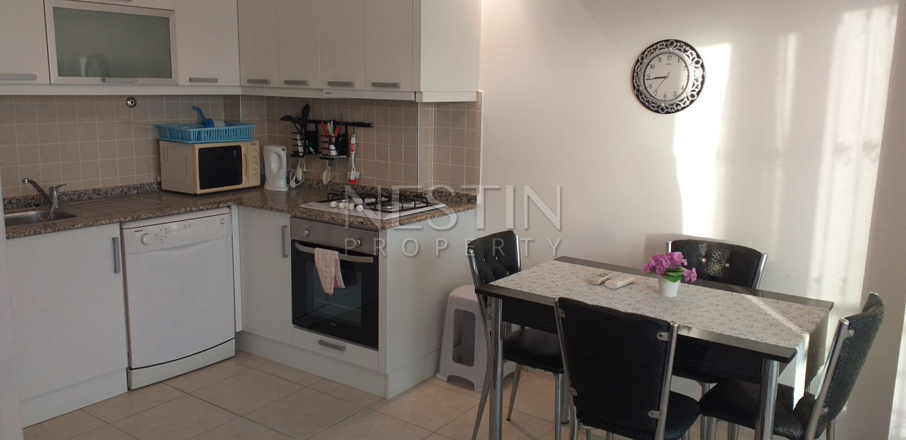 Просторная квартира 1+1 с видом на море в районе Джикджилли фото 12