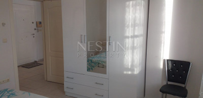 Просторная квартира 1+1 с видом на море в районе Джикджилли фото 17