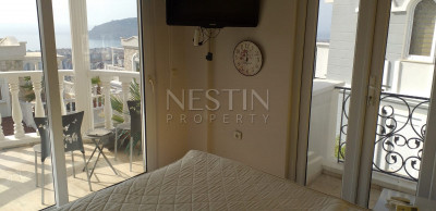 Вилла 4+1 в районе Джикджилли с прекрасным панорамным видом на море и крепость фото 21