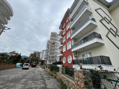 Уютная квартира 2+1 с отдельной кухней в районе Тосмур фото 3