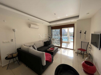 Квартира 1+1 с большой терассой в жилом комплексе района Джикджилли фото 11