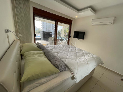 Квартира 1+1 с большой терассой в жилом комплексе района Джикджилли фото 15