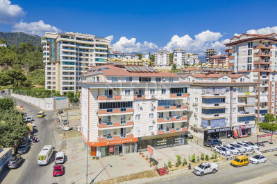 Большая квартира планировкой 4+1 в районе Джикджилли фото 1