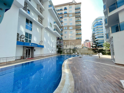 Большая квартира 1+1 в районе Махмутлар с видом на Средиземное море фото 1