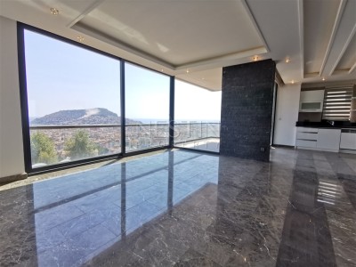 Большая квартира 2+1 в районе Хасбахче города Аланья с красивым видом фото 22