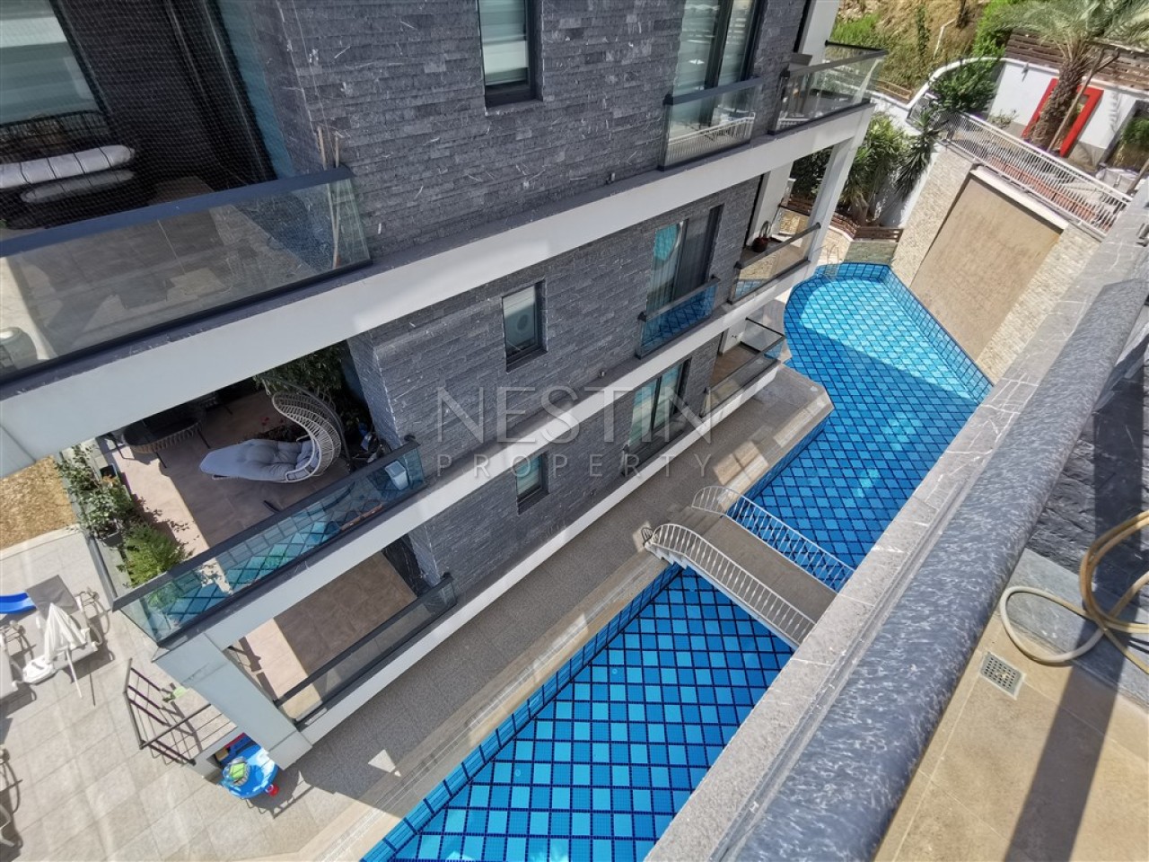 Большая квартира 2+1 в районе Хасбахче города Аланья с красивым видом фото 36