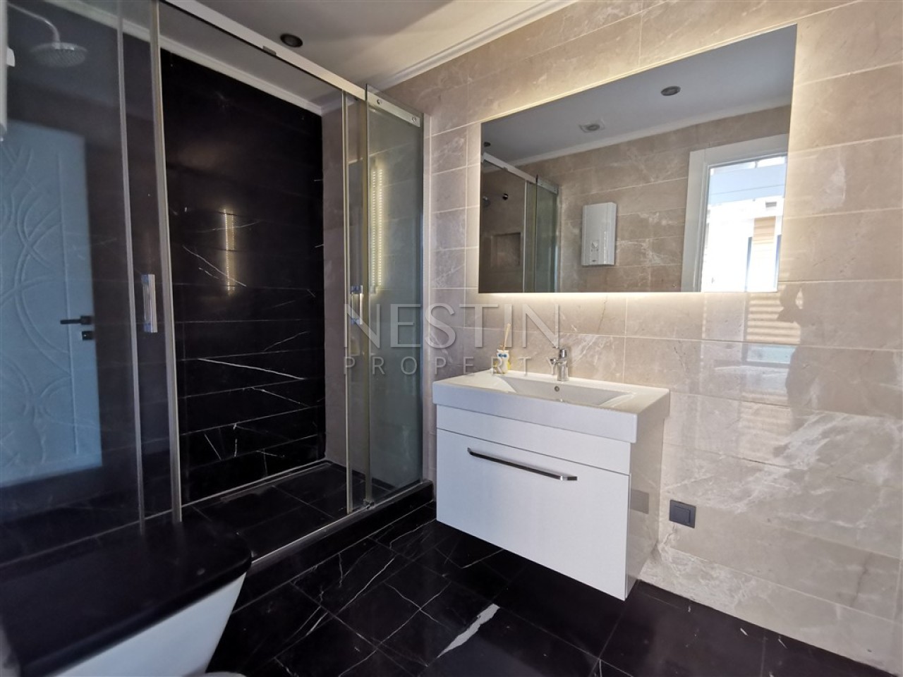 Большая квартира 2+1 в районе Хасбахче города Аланья с красивым видом фото 40