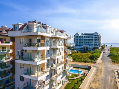 Квартира 1+1 в комплексе района Кестель с видом на море и горы фото 1