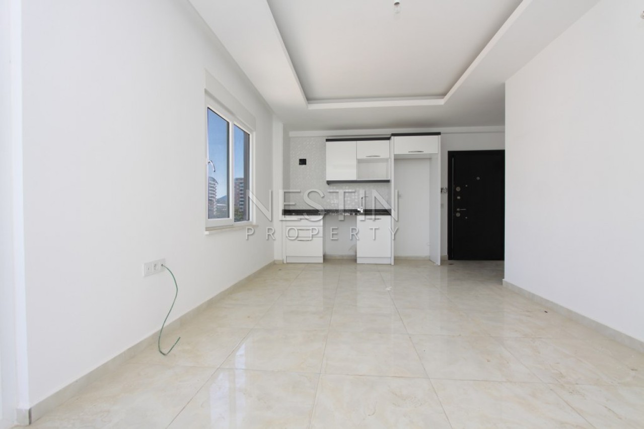 Квартира 1+1 в комплексе района Кестель с видом на море и горы фото 11