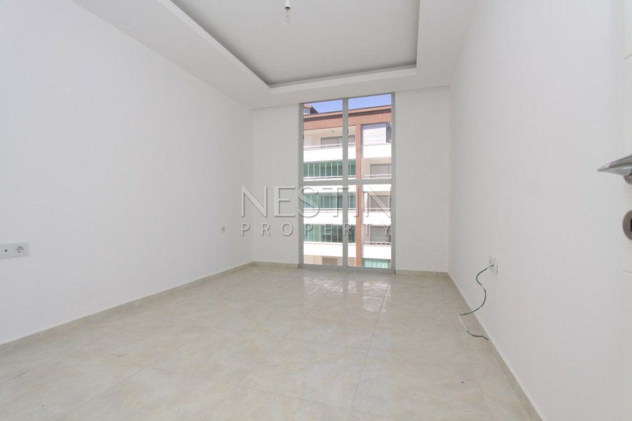 Квартира 1+1 в комплексе района Кестель с видом на море и горы фото 14