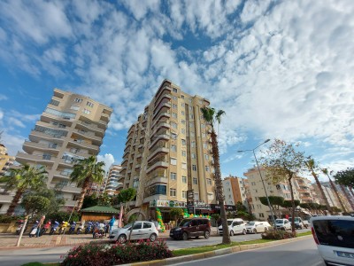 Апартаменты 3+1 с панорамным видом на город и море в районе Махмутлар фото 1