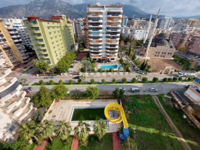 Апартаменты 3+1 с панорамным видом на город и море в районе Махмутлар фото 2