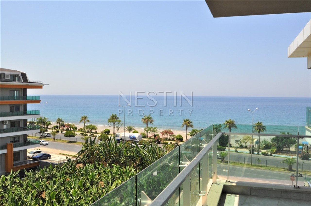 Просторный пентхаус 5+1 в районе Кестель с видом на море и горы фото 24