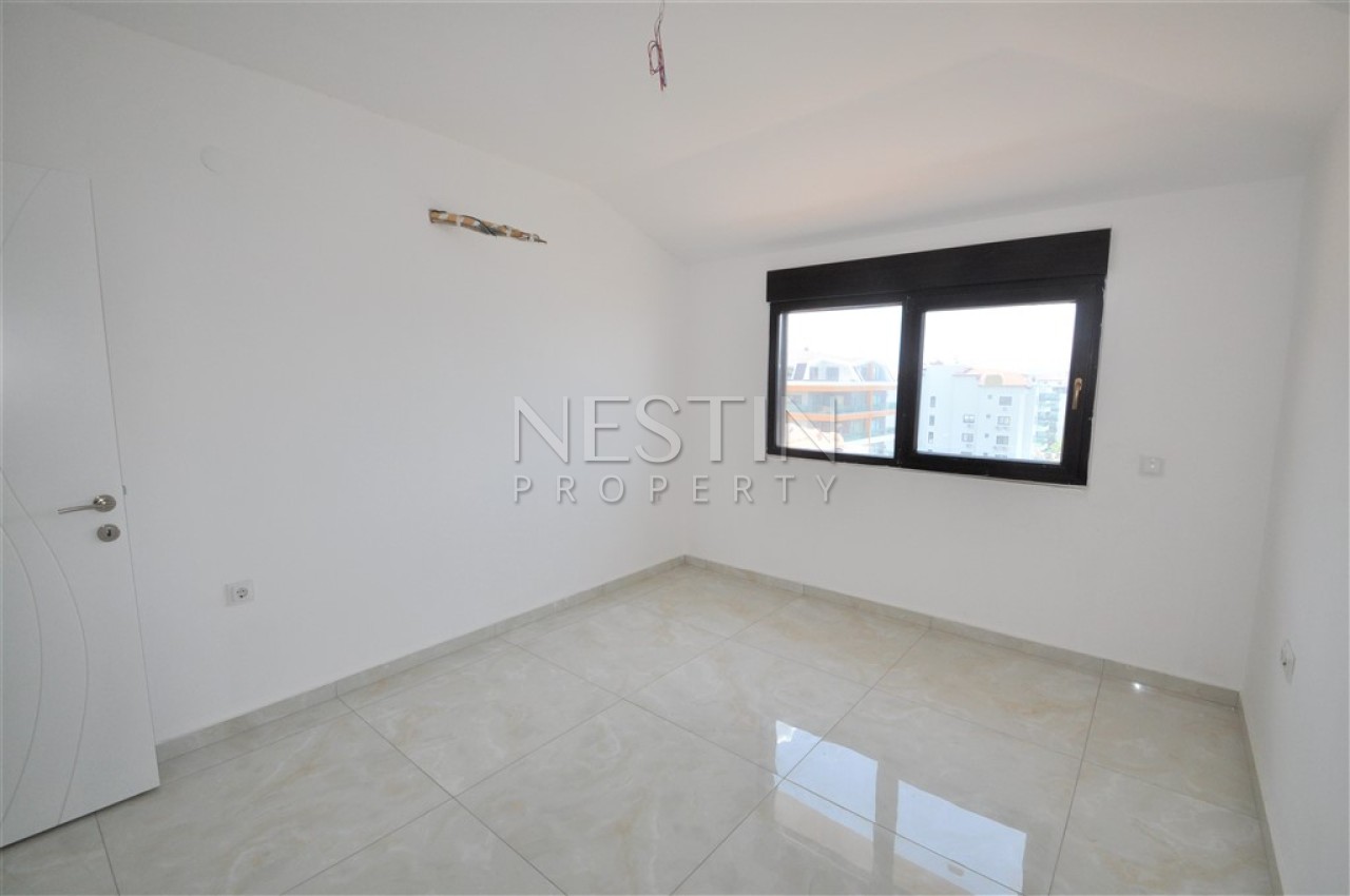 Просторный пентхаус 5+1 в районе Кестель с видом на море и горы фото 33