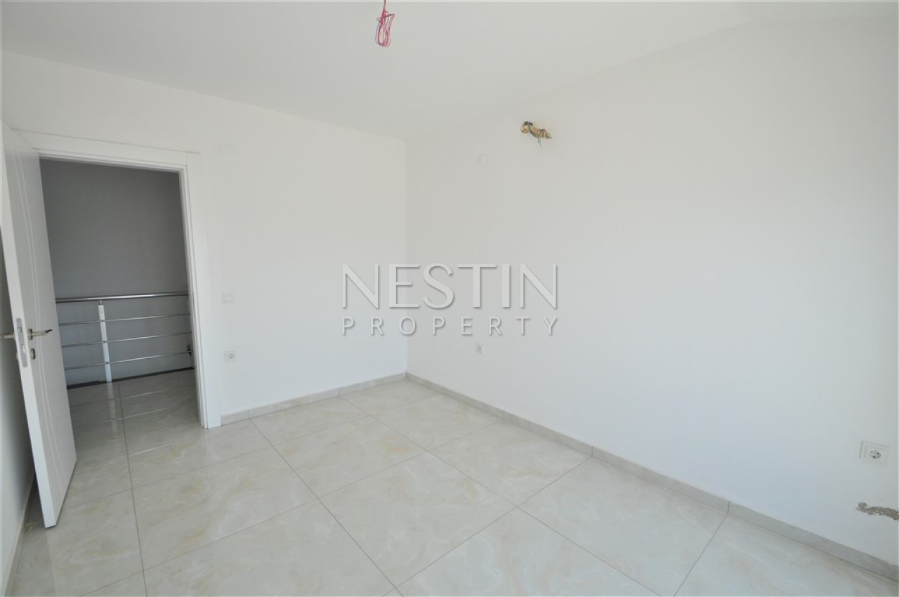 Просторный пентхаус 5+1 в районе Кестель с видом на море и горы фото 35