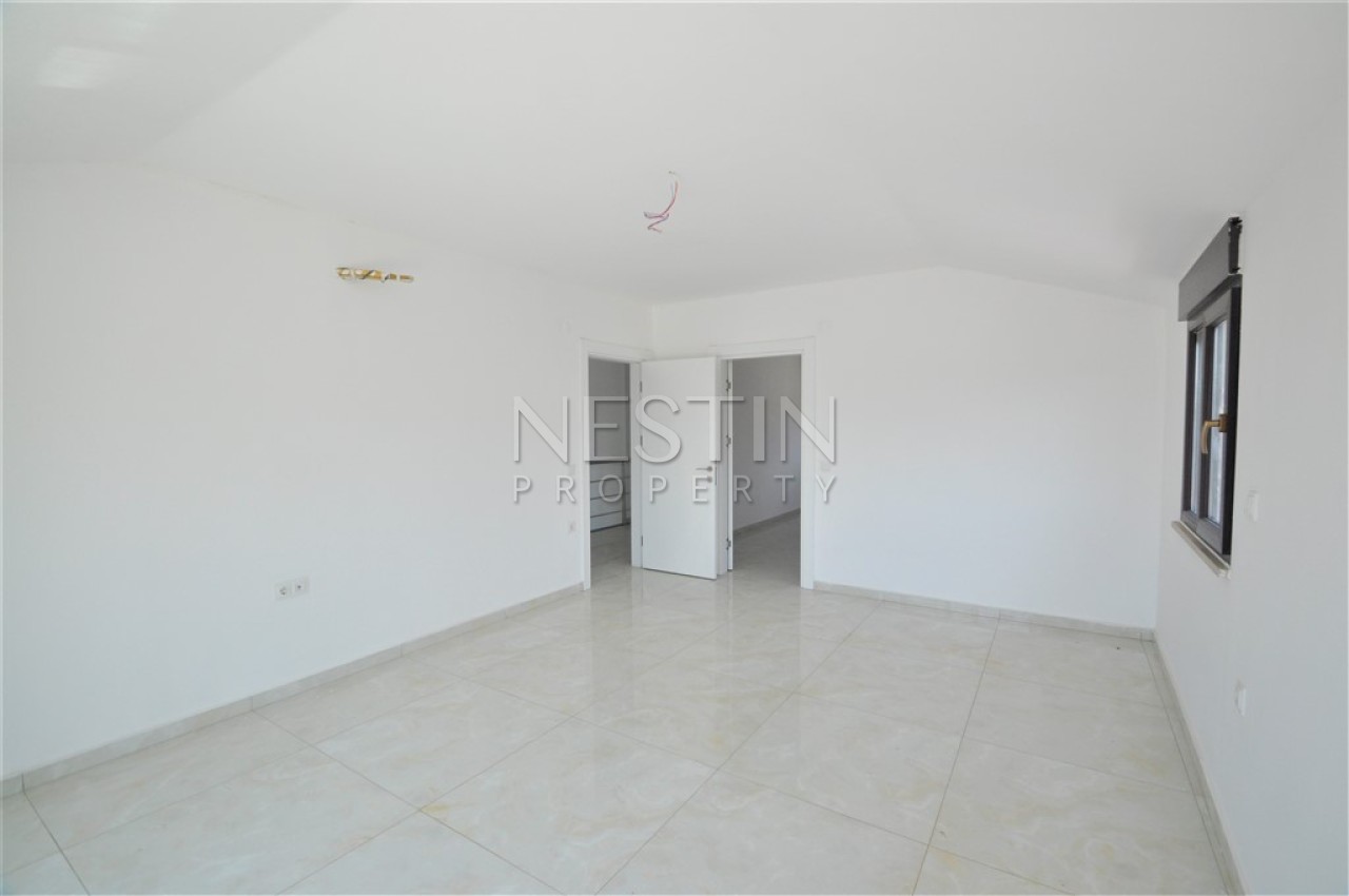 Просторный пентхаус 5+1 в районе Кестель с видом на море и горы фото 36