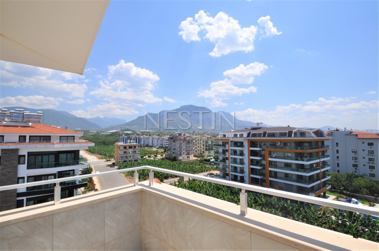 Просторный пентхаус 5+1 в районе Кестель с видом на море и горы фото 44