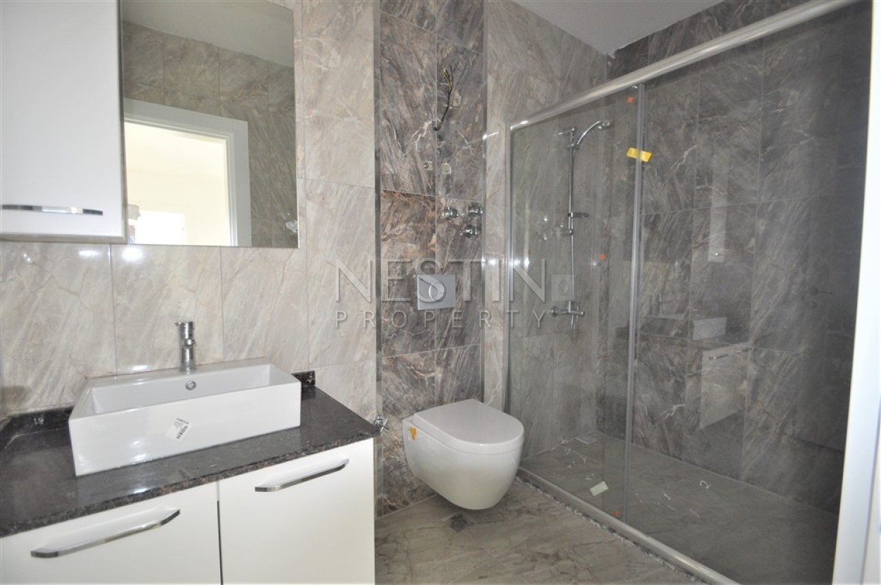 Просторный пентхаус 5+1 в районе Кестель с видом на море и горы фото 48