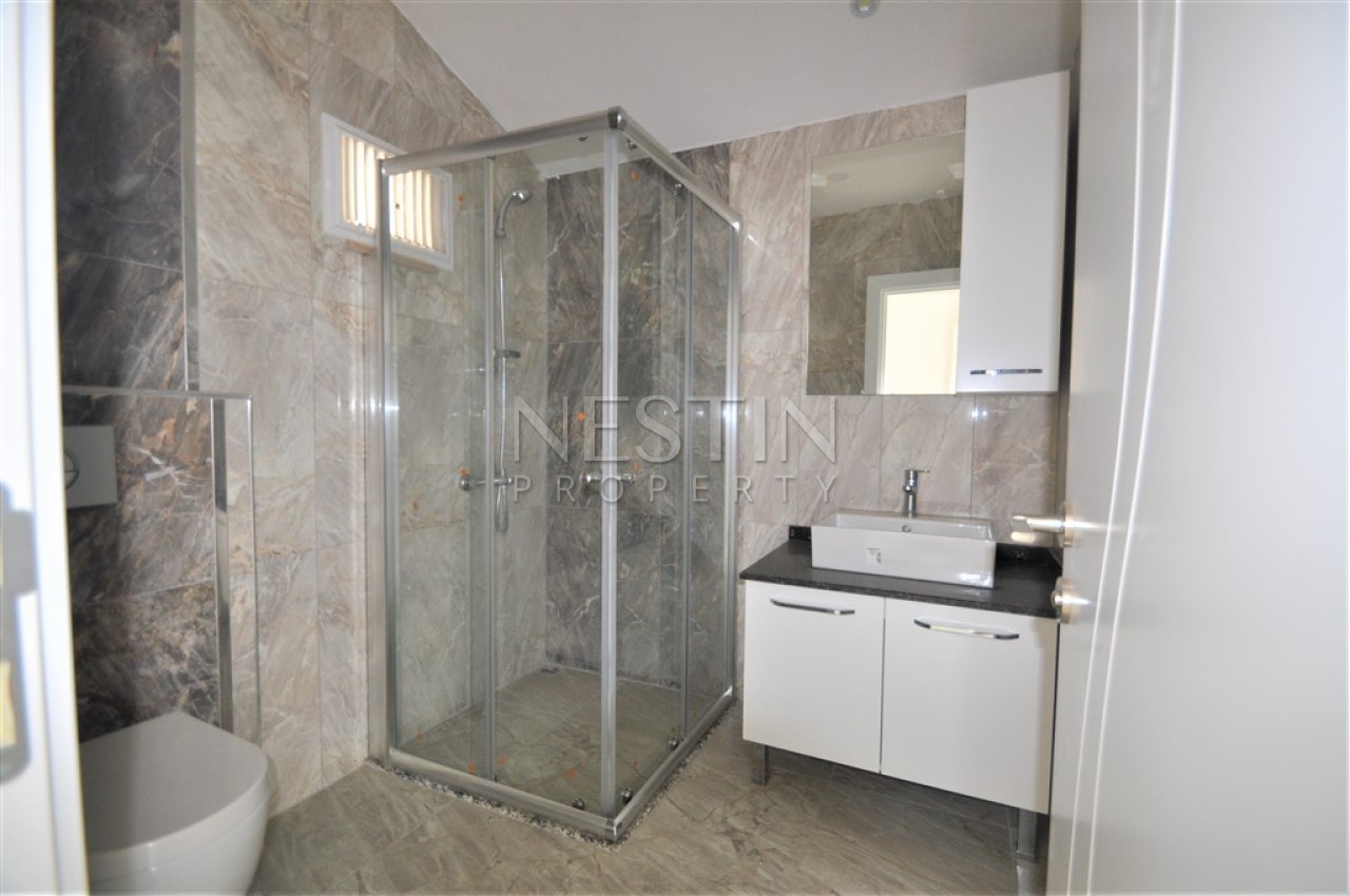 Просторный пентхаус 5+1 в районе Кестель с видом на море и горы фото 49