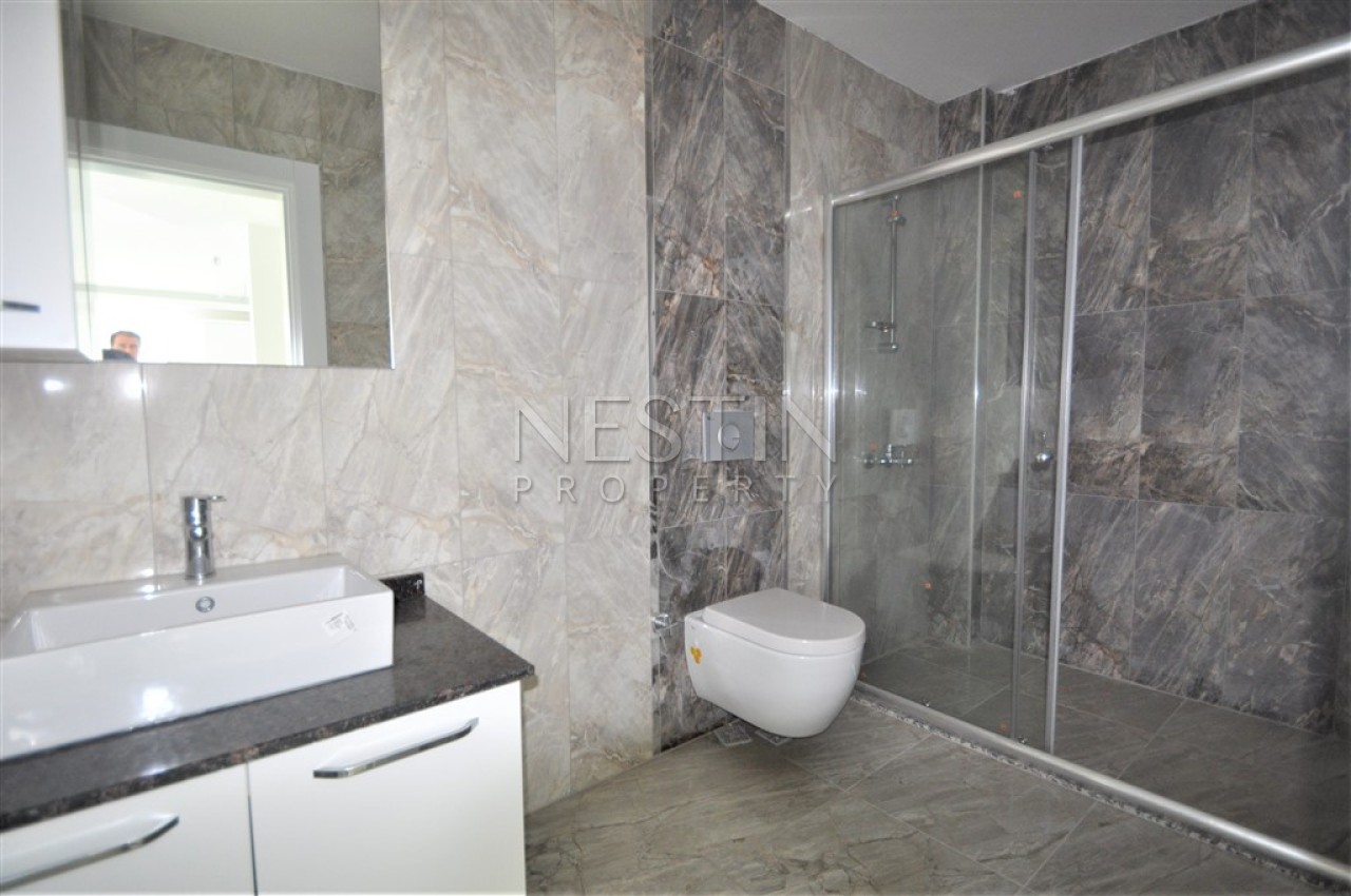 Просторный пентхаус 5+1 в районе Кестель с видом на море и горы фото 50