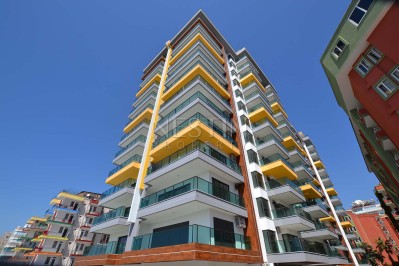 Квартира 1+1 в новом ЖК района Махмутлар с видом на море и горы фото 1