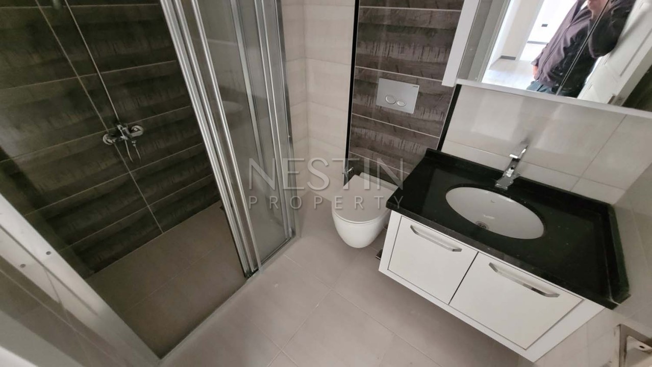 Большая квартира 2+1 с отдельной кухней в хорошем комплексе районе Махмутлар фото 40