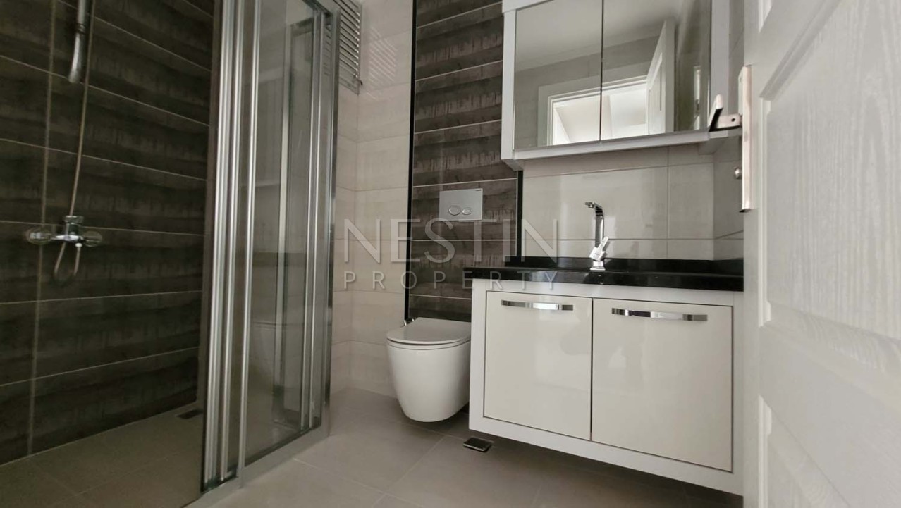 Большая квартира 2+1 с отдельной кухней в хорошем комплексе районе Махмутлар фото 42