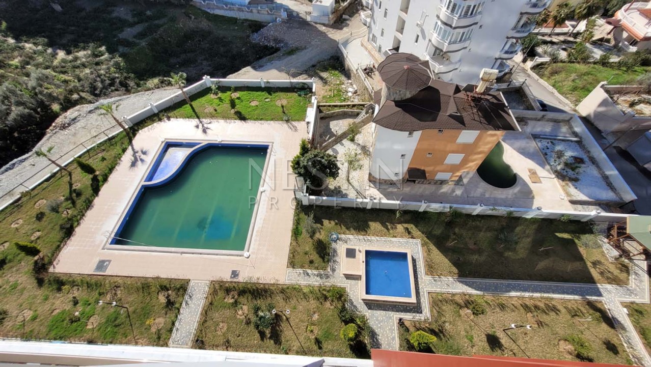 Большая квартира 2+1 с отдельной кухней в хорошем комплексе районе Махмутлар фото 43