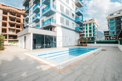 Уютная квартира 1+1 в живописном районе Каргыджак фото 1