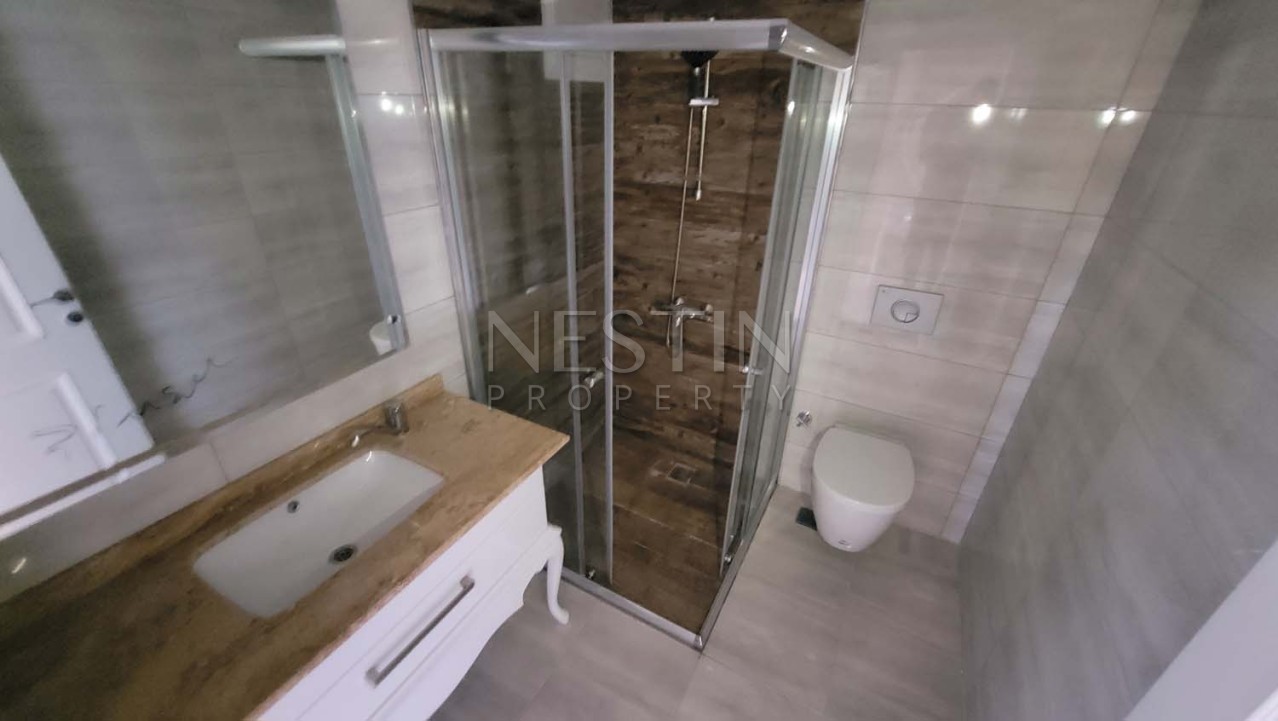 Большая квартира пентхаус 4+2 в районе Каргыджак в 350 м от моря фото 13