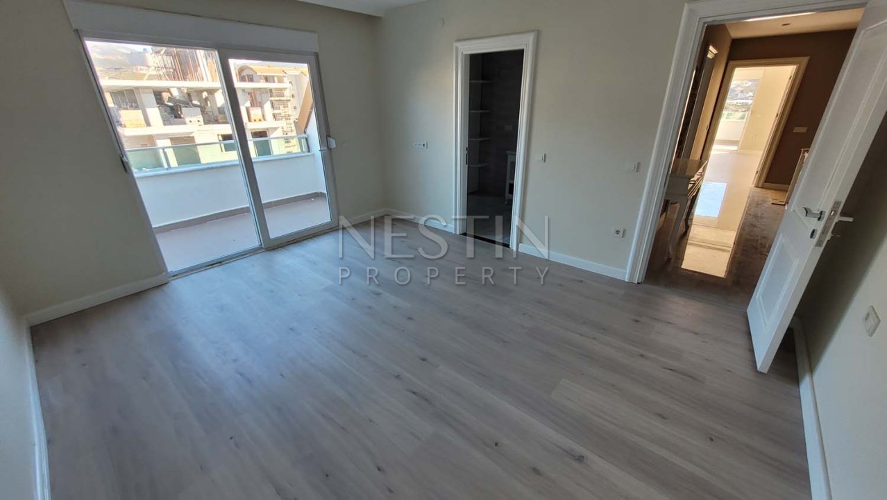 Большая квартира пентхаус 4+2 в районе Каргыджак в 350 м от моря фото 17