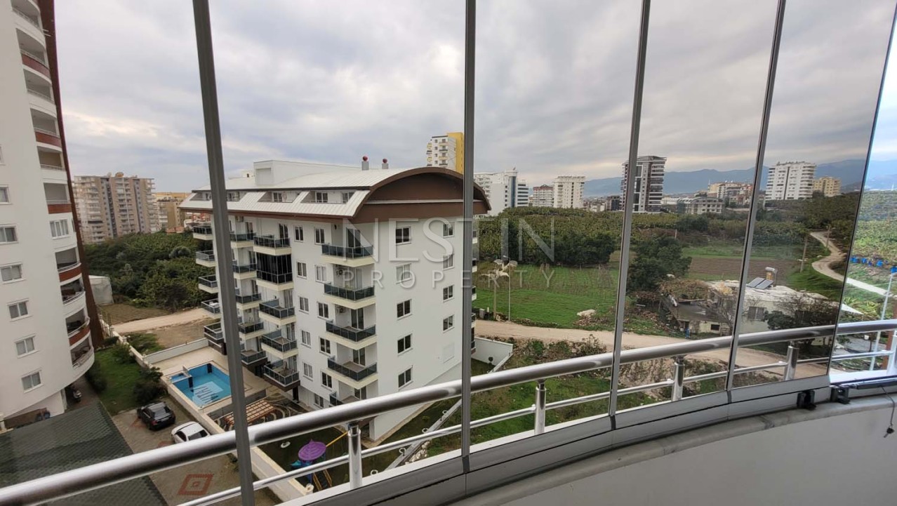 Уютная квартира 2+1 в районе Махмутлар с видом на горы фото 15