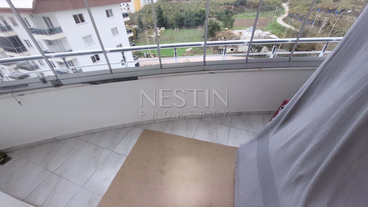 Уютная квартира 2+1 в районе Махмутлар с видом на горы фото 17