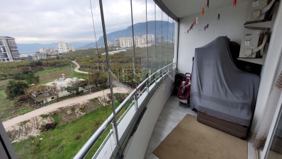 Уютная квартира 2+1 в районе Махмутлар с видом на горы фото 18