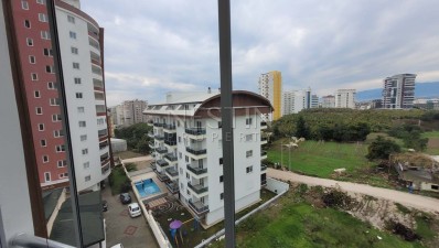 Уютная квартира 2+1 в районе Махмутлар с видом на горы фото 20