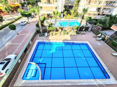 Меблированные апартаменты 2+1 в благоустроенном комплексе в районе Махмутлар фото 3