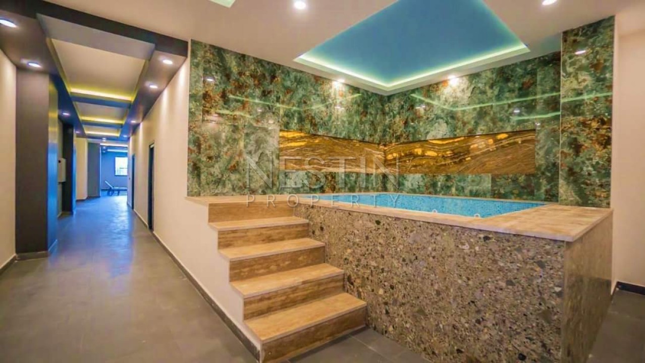 Меблированные апартаменты 2+1 в благоустроенном комплексе в районе Махмутлар фото 6