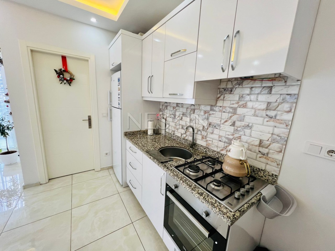 Уютная квартира студия 0+1 в хорошем комплексе района Махмутлар фото 12