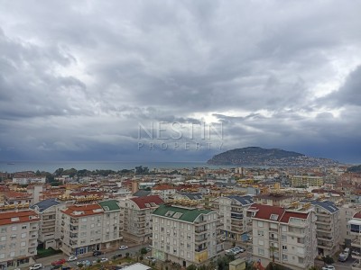 Квартира пентхаус 4+1 в районе Джикджилли с красивым видом на море и горы фото 18