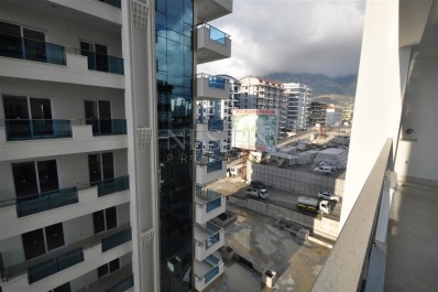 Просторная квартира 1+1 в хорошем, новом комплексе района Махмутлар фото 22