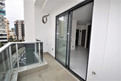 Квартира 1+1 в новом ЖК района Махмутлар в 600 м от моря фото 38