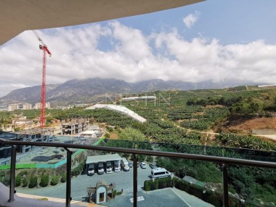 Квартира 1+1 в благоустроенном комплексе с видом на горы в районе Махмутлар фото 31