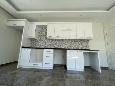 Квартиры планировкой 1+1 в новом комплексе района Авсаллар фото 12