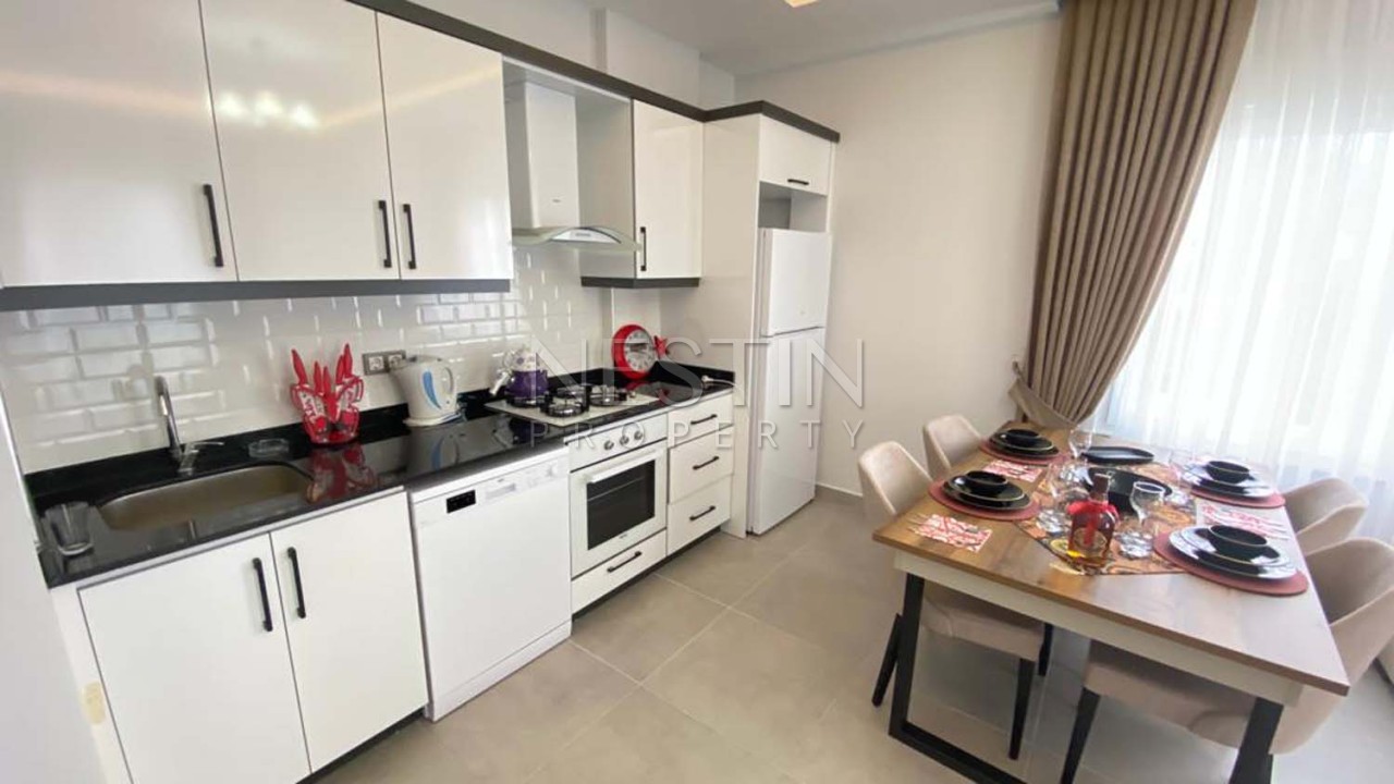 Апартаменты 1+1 с видом на горы в районе Махмутлар фото 14