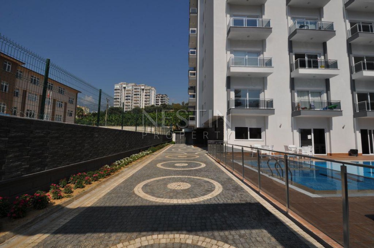 Квартира 1+1 в современном комплексе в районе Махмутлар фото 2