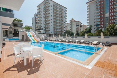 Квартира 1+1 в современном комплексе в районе Махмутлар фото 3