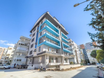 Квартира 1+1 в новом доме в районе Махмутлар в 350 м от Средиземного моря фото 1