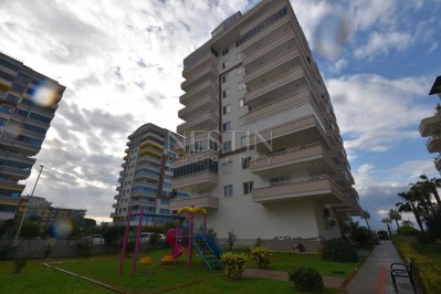 Просторная квартира 2+1 с отдельной кухней в районе Махмутлар с 50 м от моря фото 1